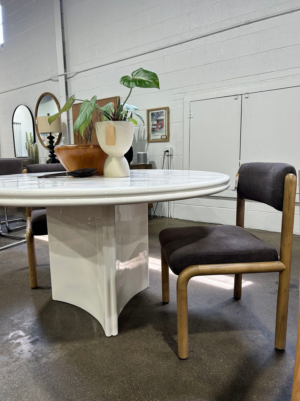 CB2 Vesper 55in Round White Resin Dining Table - Image 6