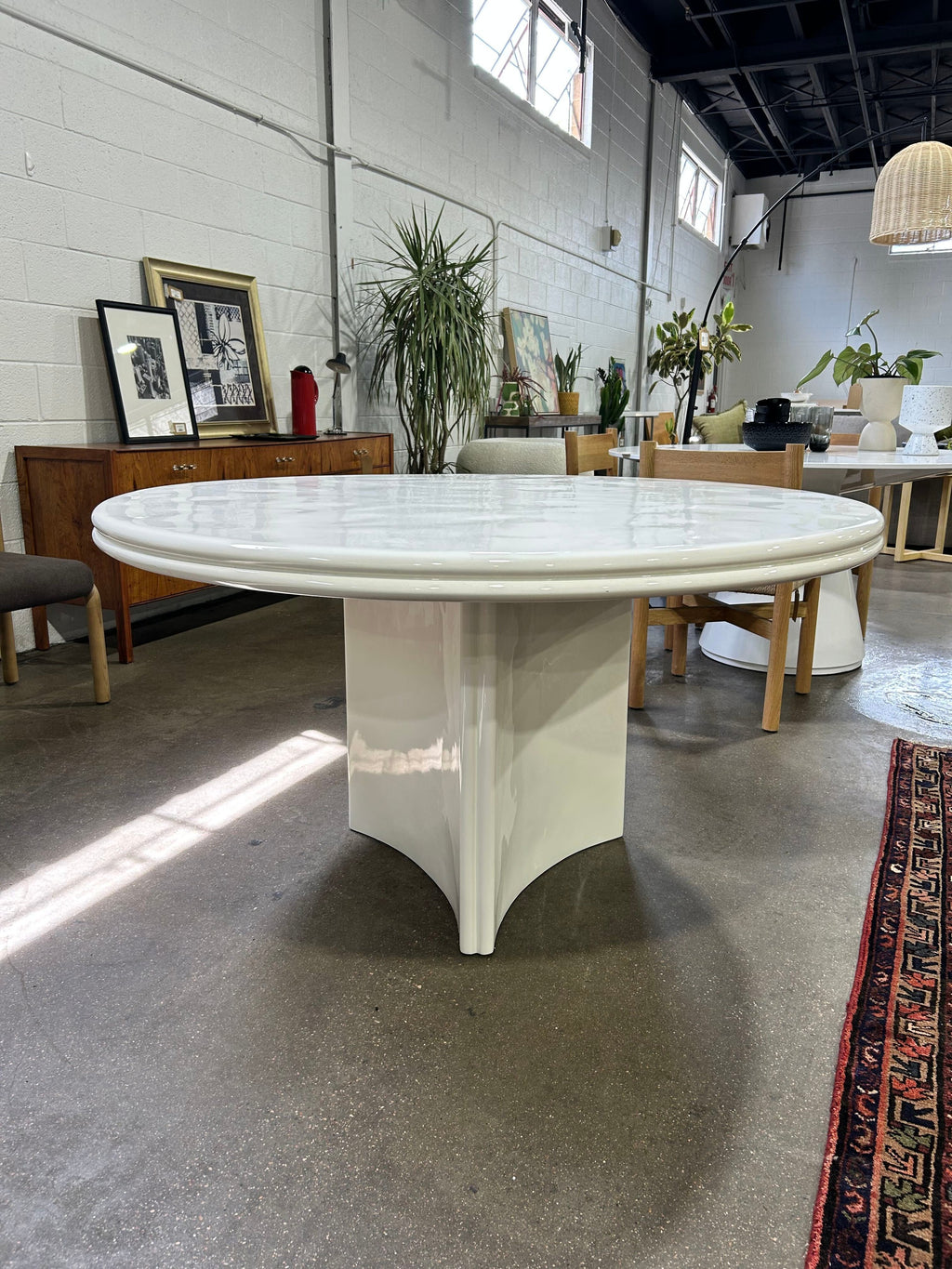 CB2 Vesper 55in Round White Resin Dining Table - Image 5