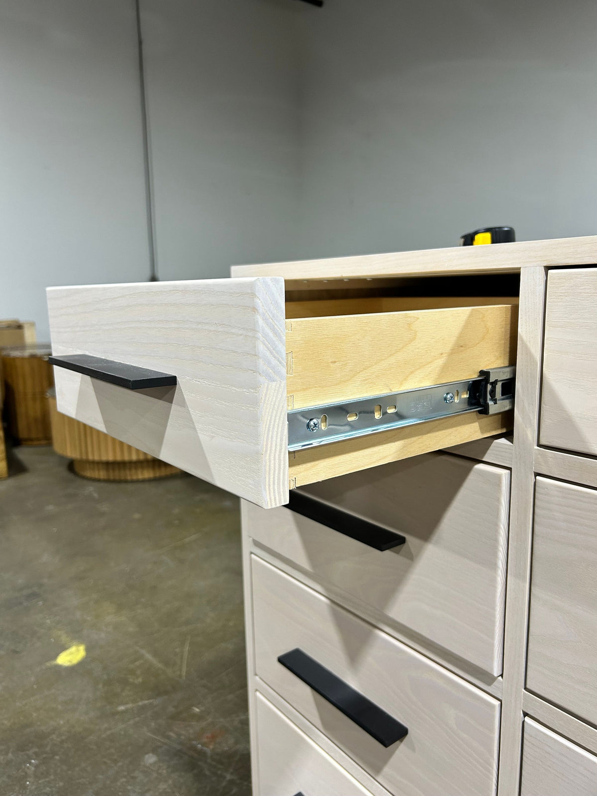 Alden 9 Drawer Dresser in Sand Stain on Ash - Image 6